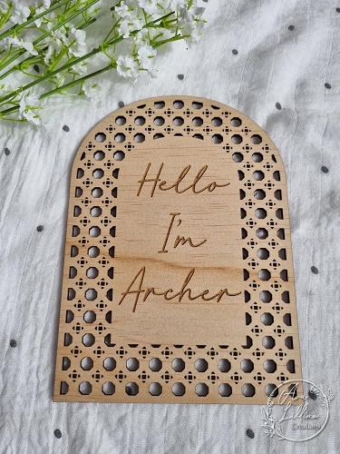 Rattan baby announcement arch